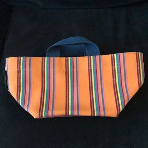 Herve orange and stripes hand bag